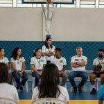 Community gathering discussing sport x athletic in school sports policy