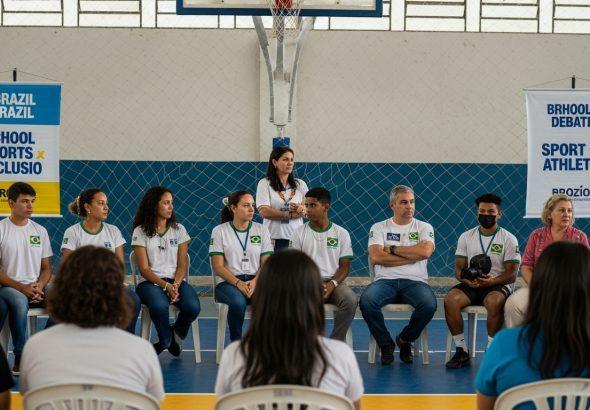 Community gathering discussing sport x athletic in school sports policy